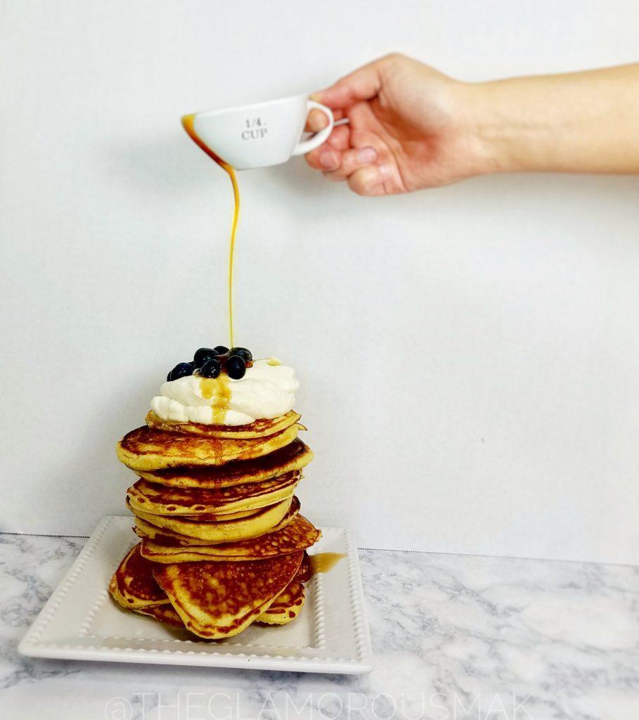 Give your mornings and interesting twist with these fluffy lemon pancakes with blueberries, ricotta and almond flour. This blueberry pancake recipe is easy to make from scratch. Simply serve with maple syrup or maple whipped cream to amp up your breakfast.