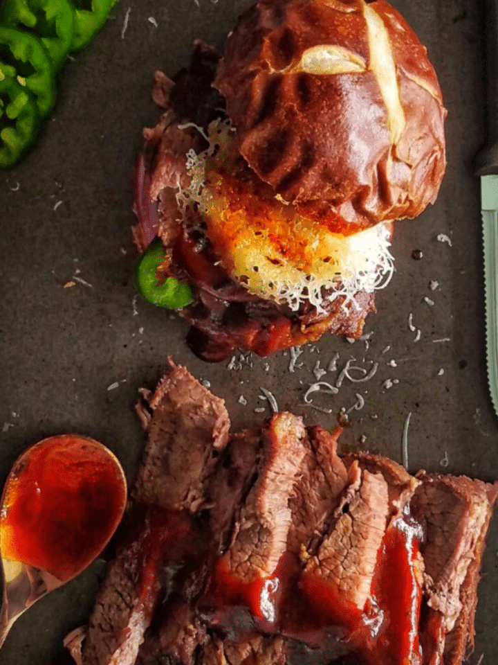 bbq brisket sandwiches with jalapeno pomegranate bbq sauce on pretzel buns recipe found on mandyolive.com