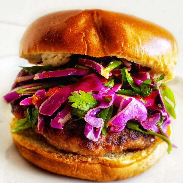 Sweet and spicy pork burgers with red cabbage slaw