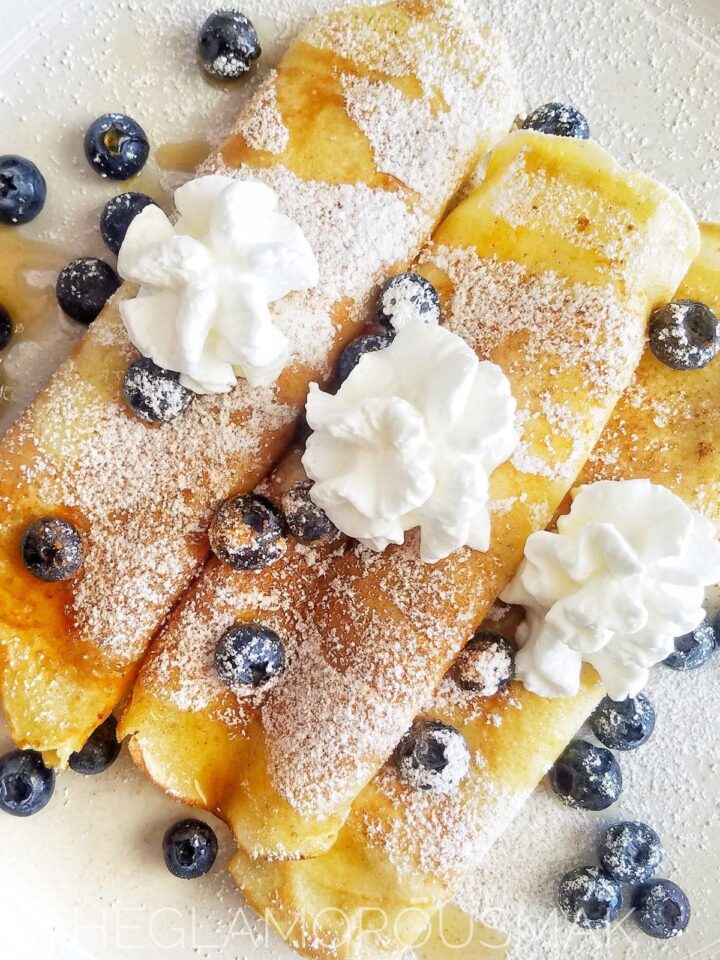 How to make crepes with this simple recipe. With only 5 ingredients this is a quick breakfast, lunch, brunch or dinner. Stuff your crepes with berries, strawberries, blueberries and top with whipped cream and maple syrup. | French, flour, milk, sugar, eggs, how to cook crepes, cast iron pan