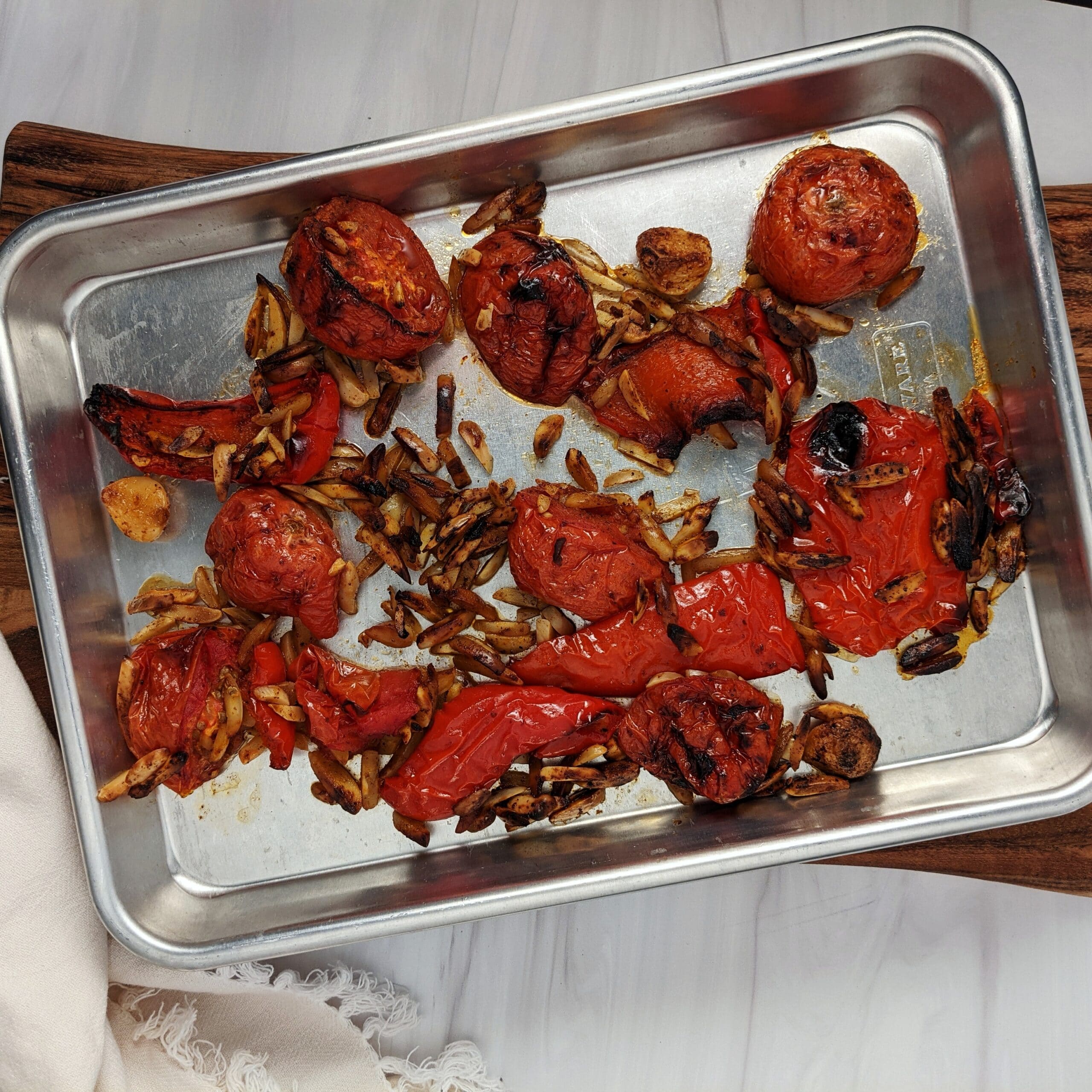 roasted tomatoes, garlic, red peppers, and almonds
