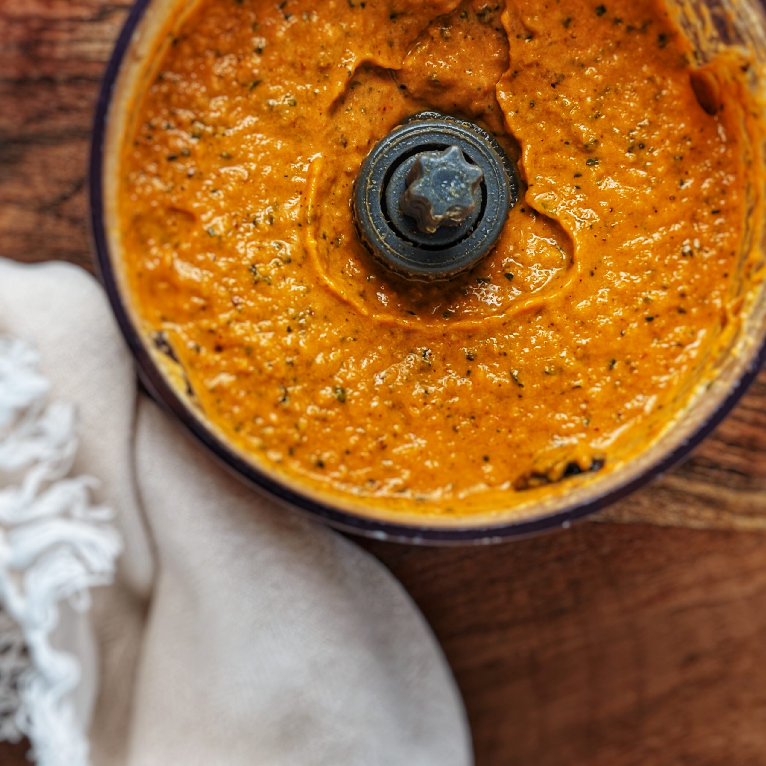 close up of romesco sauce in food processor