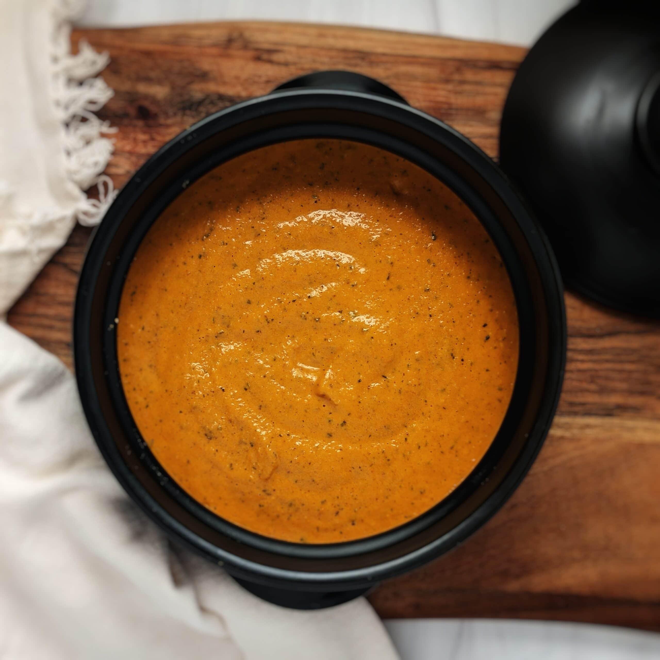 romesco style sauce in dolsot on wooden board