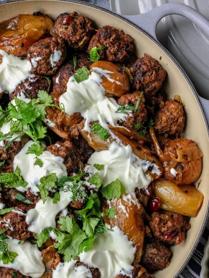 meatballs and potatoes in braiser pan