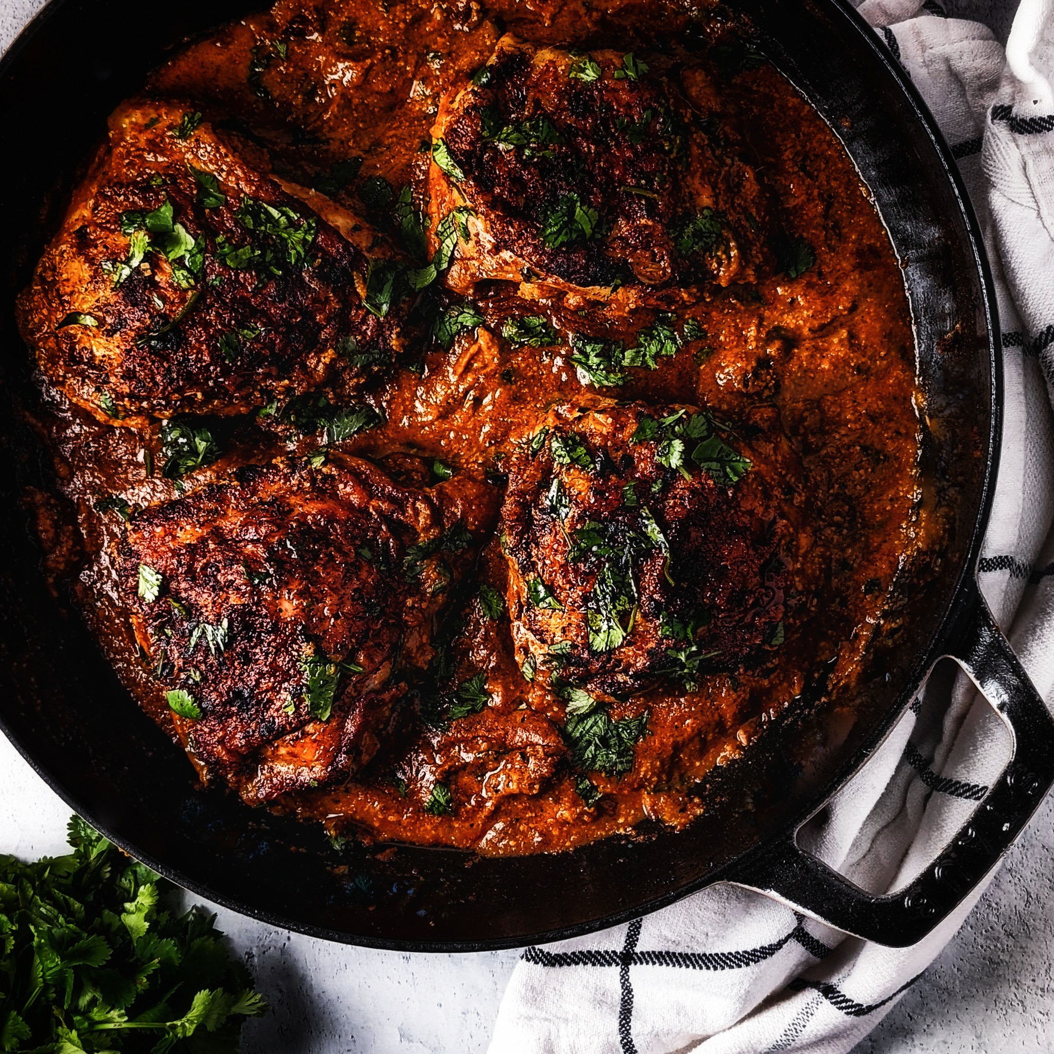 lime chicken thighs with pepita mole in staub enamel cast iron braiser